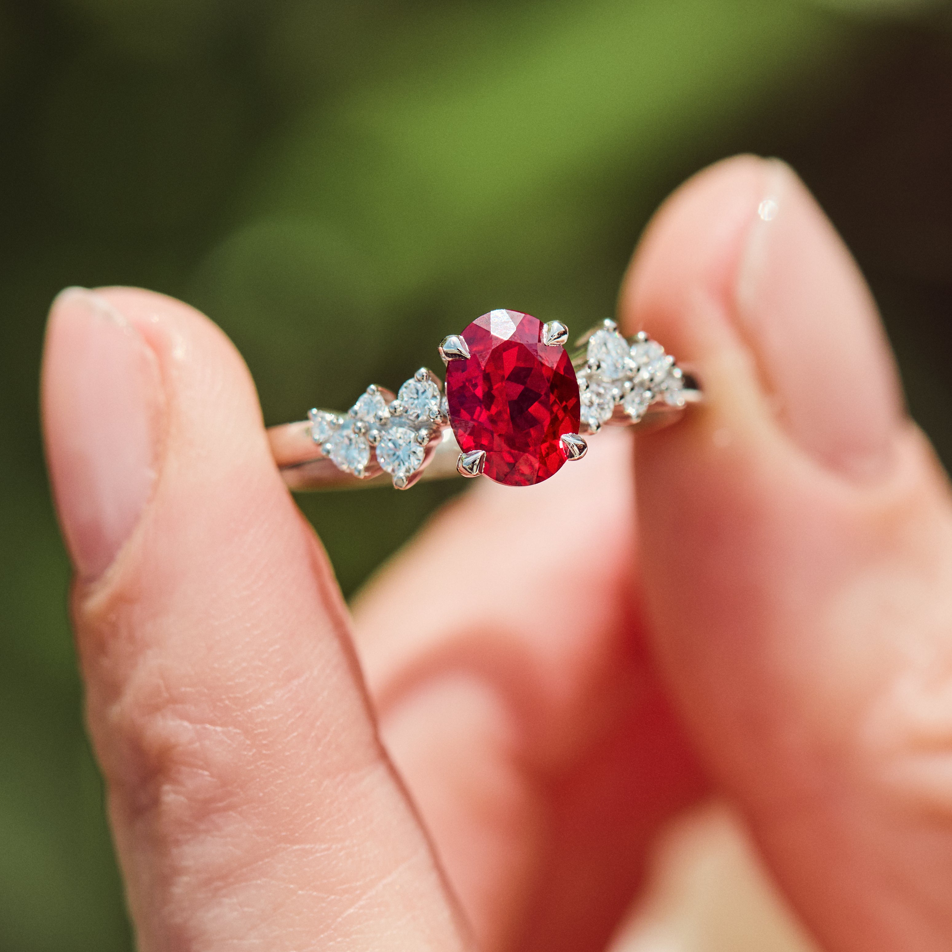 oval lab grown ruby engagement ring in platinum