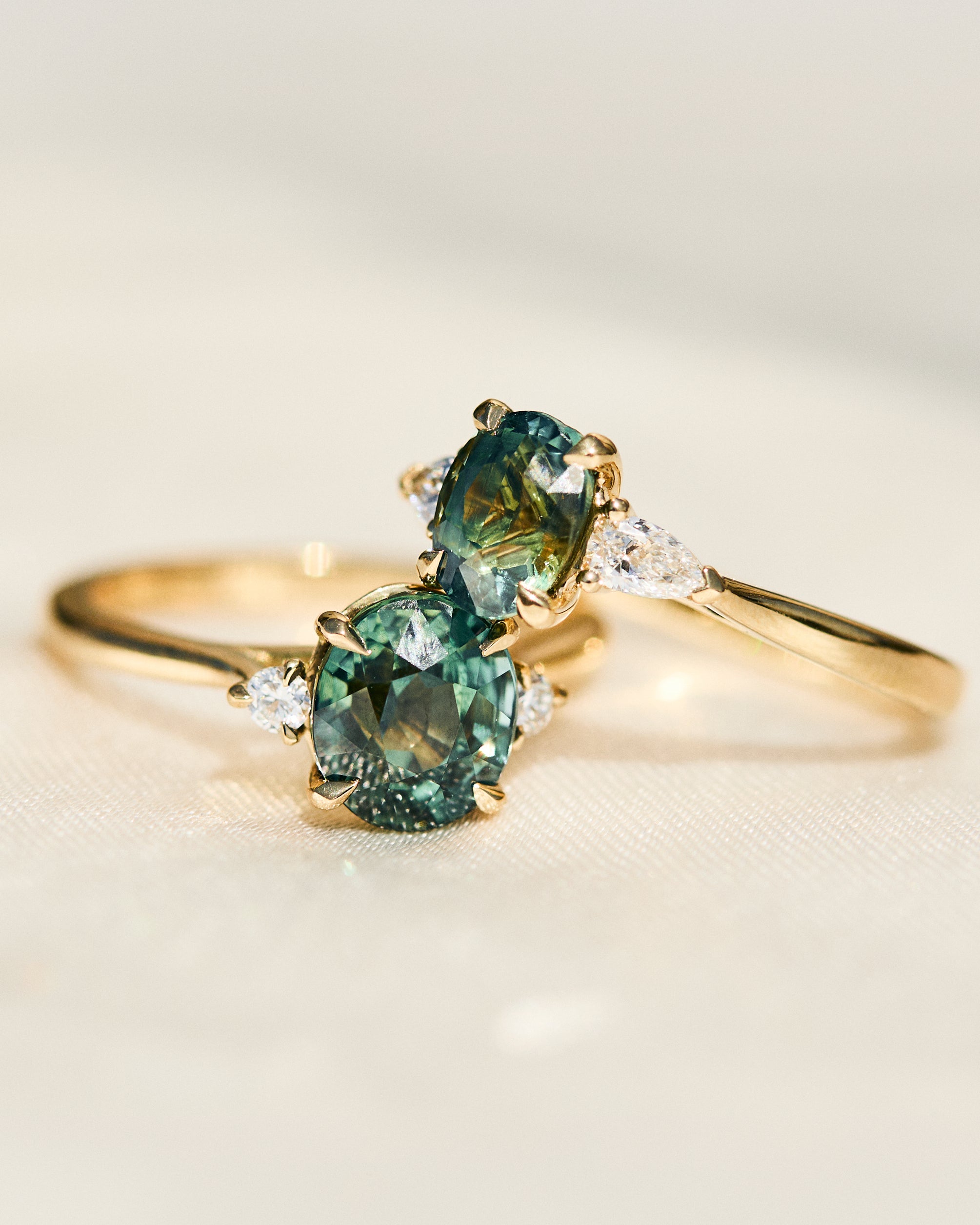 oval sapphire engagement rings in yellow gold
