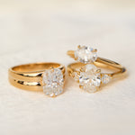 trio of yellow gold diamond rings