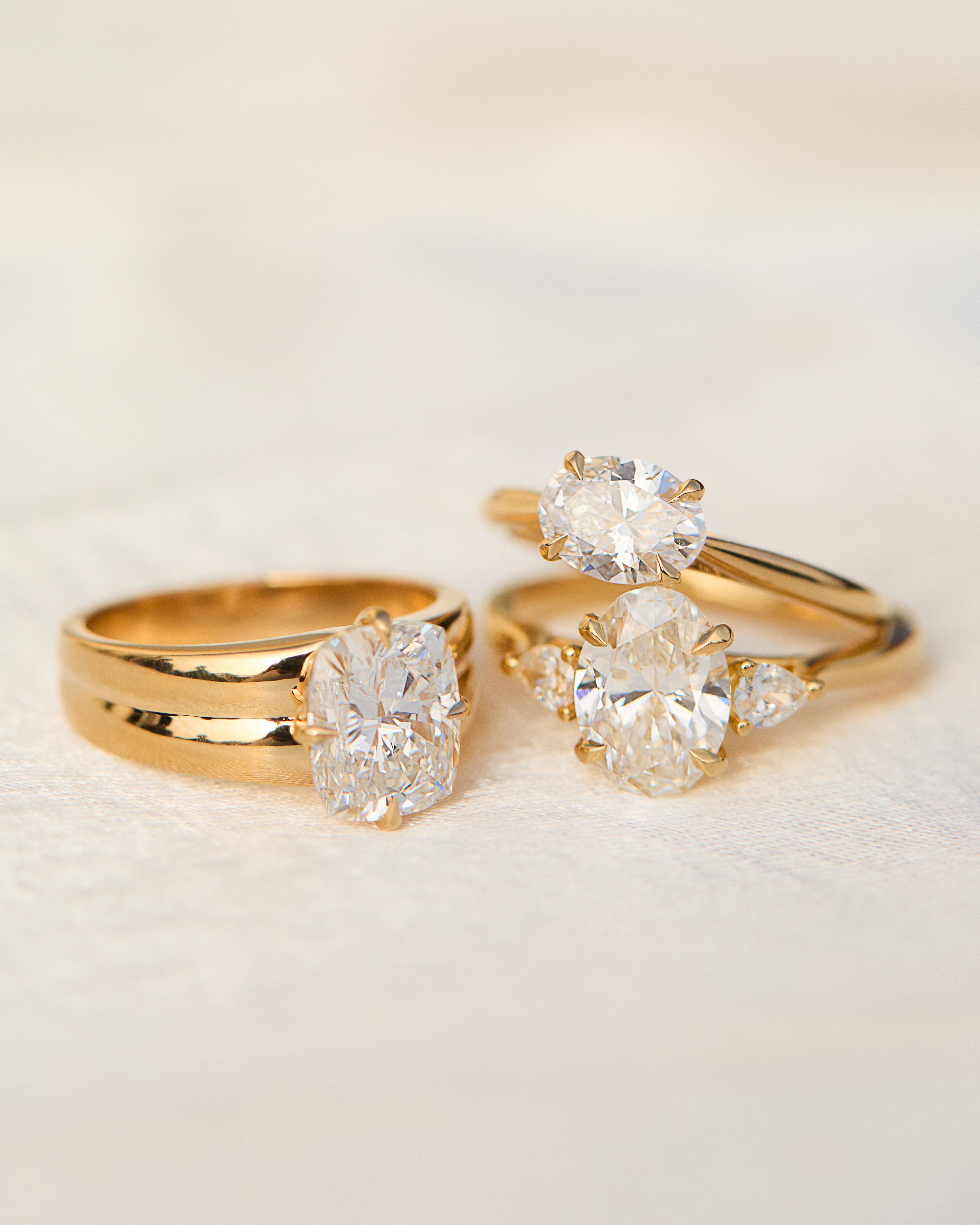 trio of yellow gold diamond rings