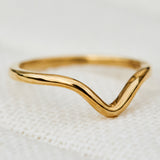yara curved wedding band in yellow gold