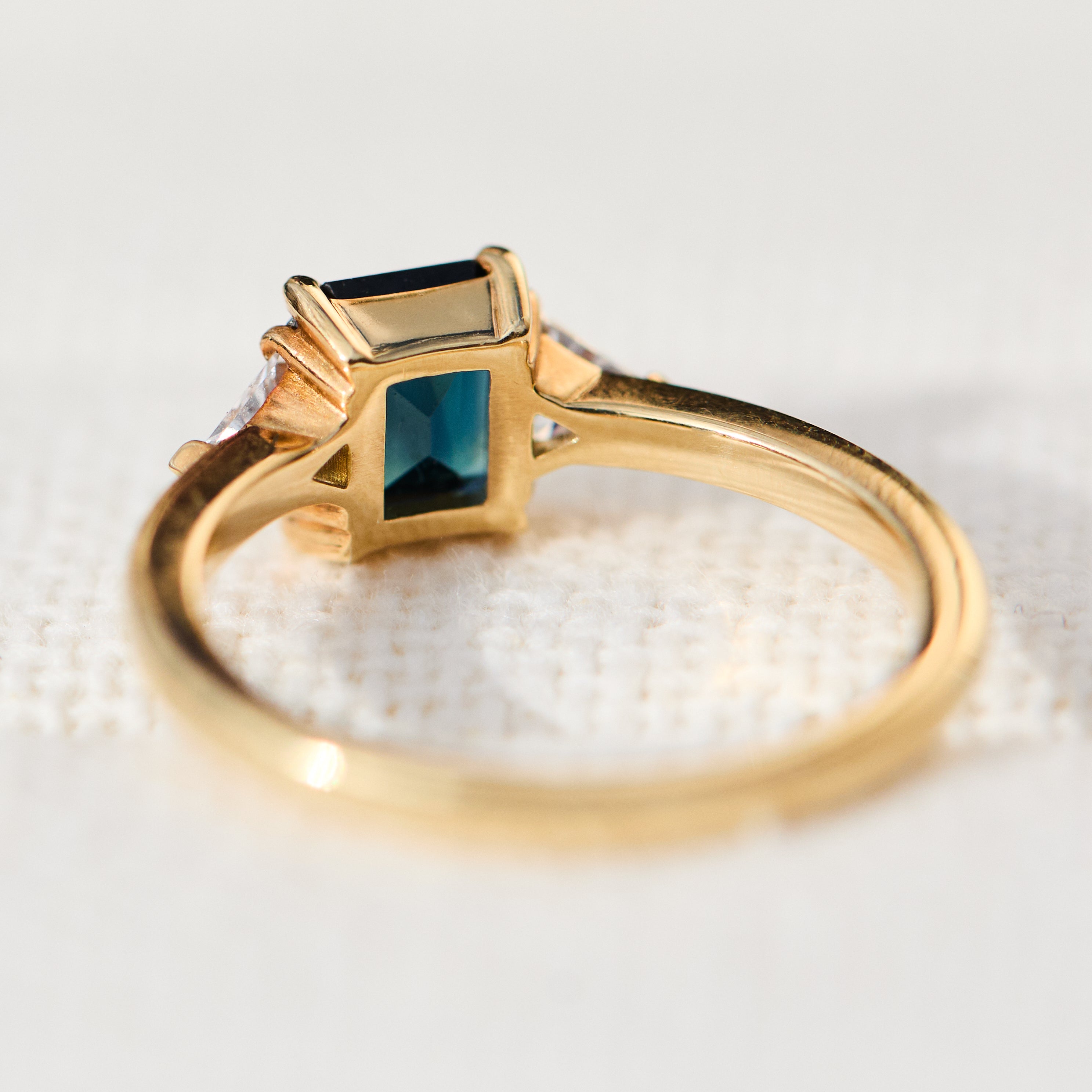emerald cut teal sapphire ring