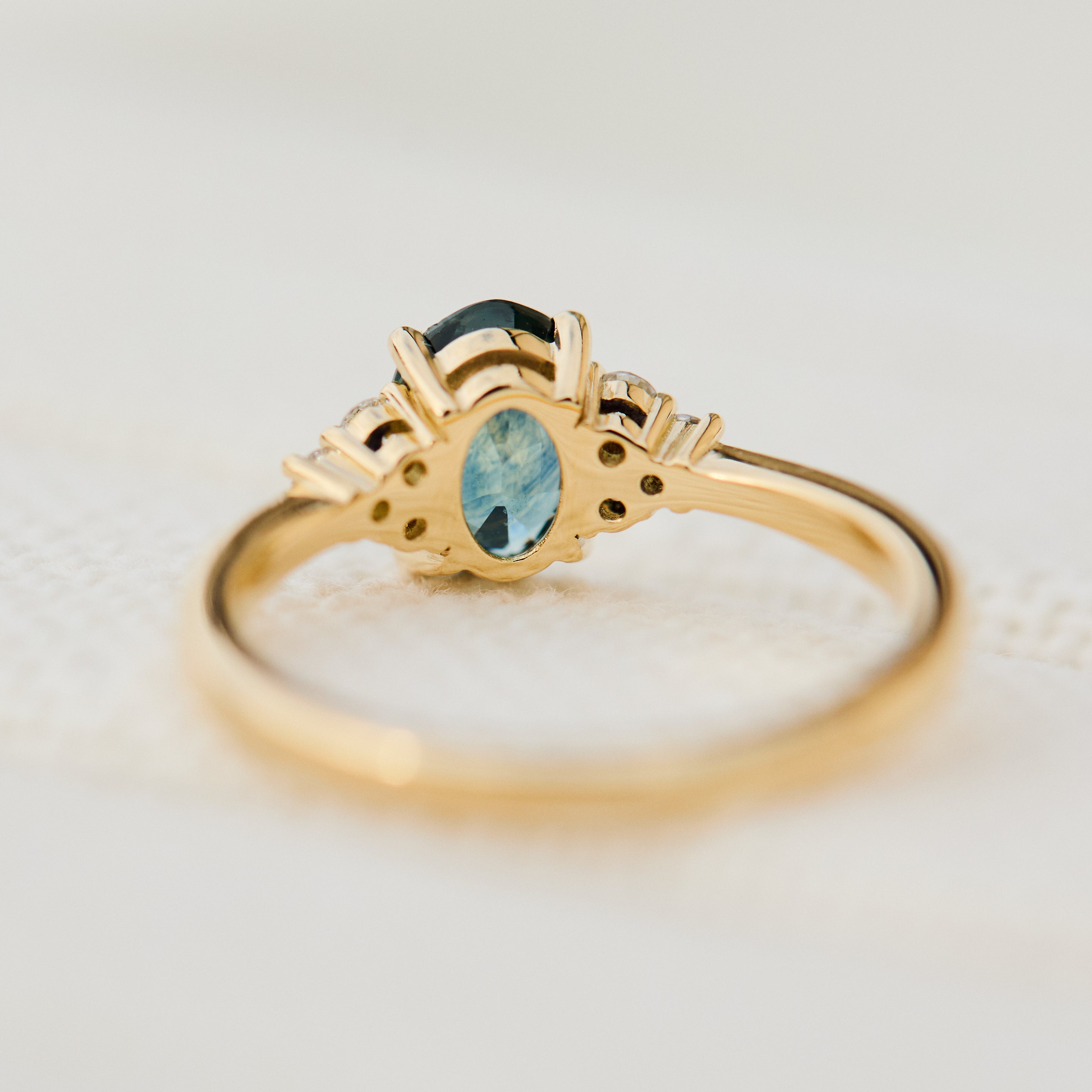 oval green teal sapphire ring