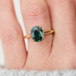 oval teal sapphire solitaire ring