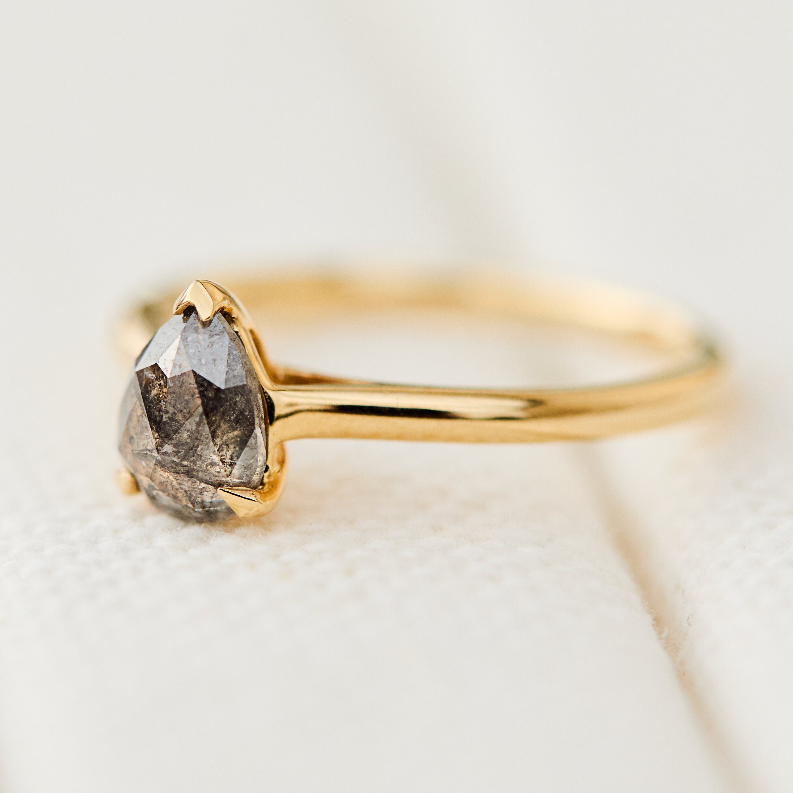 pear shape salt and pepper solitaire ring