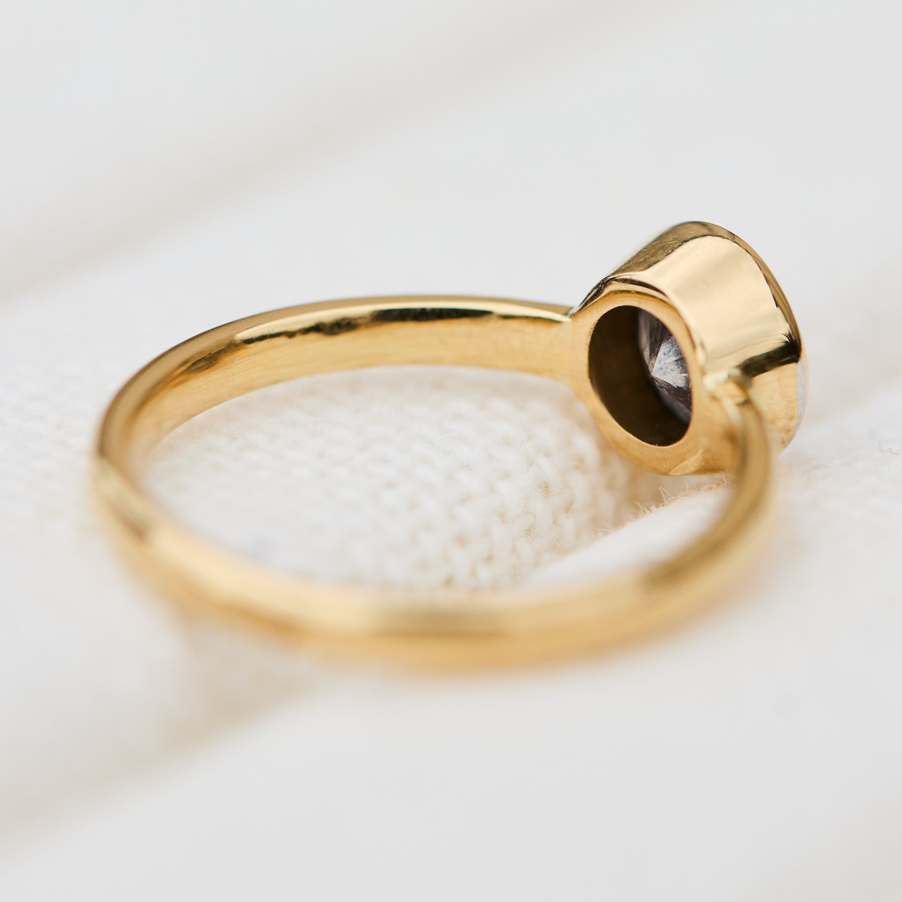 18ct yellow gold salt and pepper round brilliant cut diamond engagement bezel ring