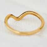yara curved wedding band in yellow gold