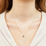 Geometric black triangular diamond necklace in 18ct yellow gold.