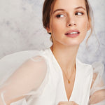 Yellow pear-shaped sapphire and diamond necklace in 18ct yellow gold.