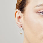 Handmade yellow sapphire and diamond drop earrings in 18ct yellow gold.