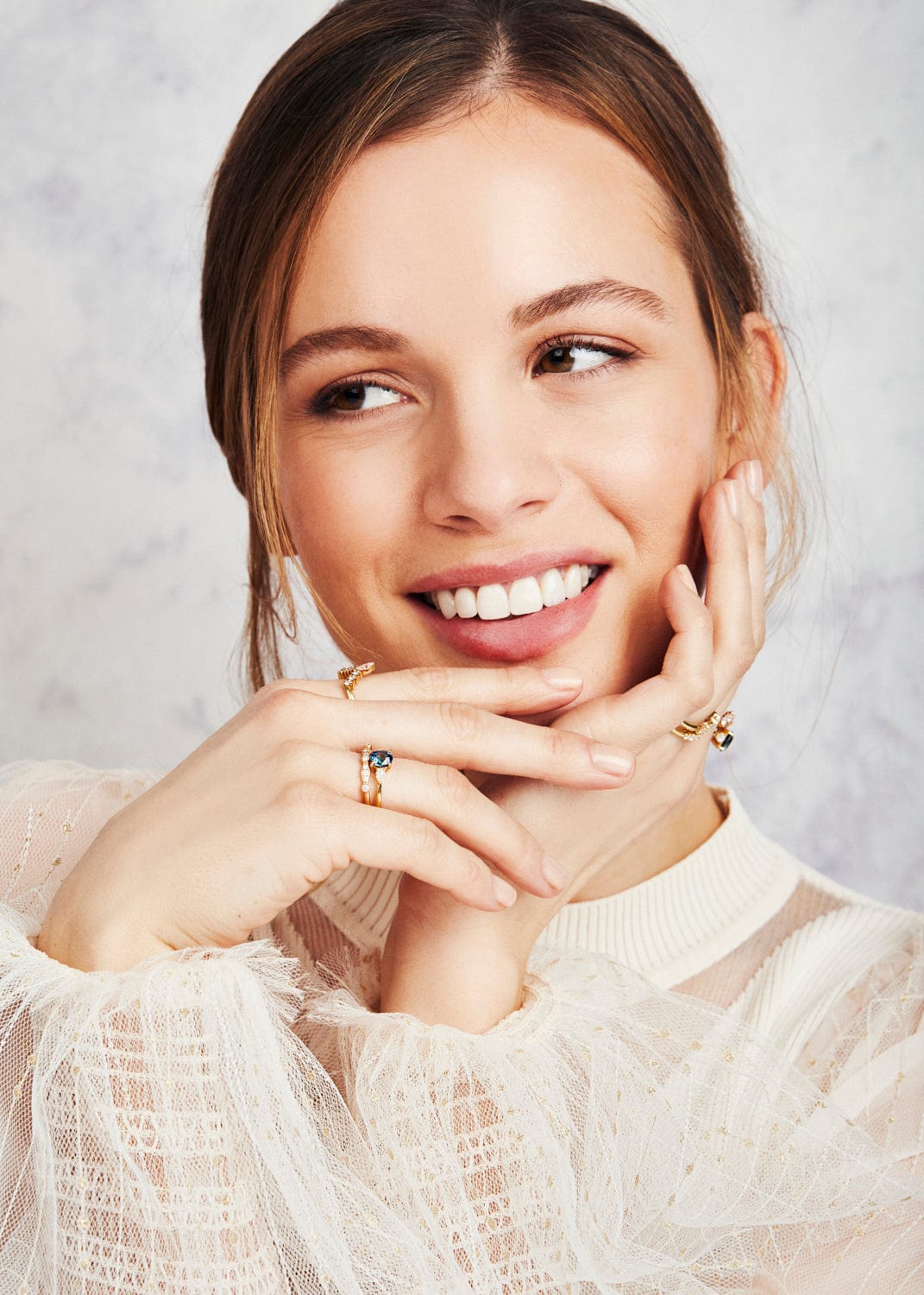 18ct yellow gold oval trilogy ​teal sapphire rings