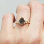 18ct yellow gold salt and pepper pear diamond engagement trilogy ring