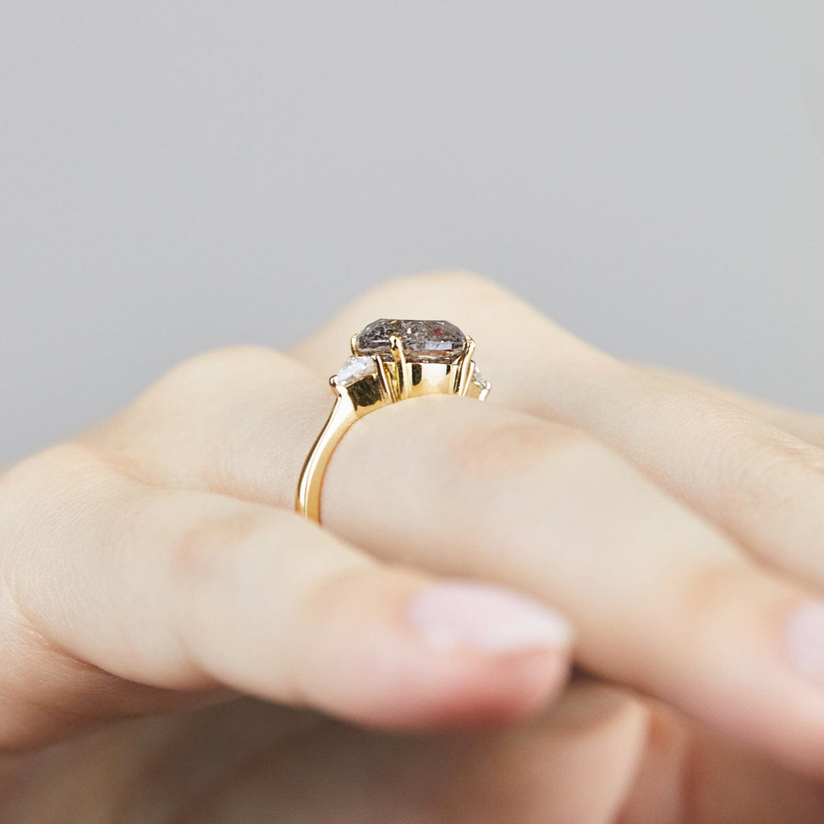 18ct yellow gold salt and pepper round brilliant cut diamond engagement trilogy ring
