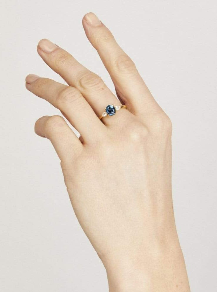 18ct yellow gold oval trilogy ​teal sapphire rings