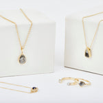 Salt and pepper diamond and white trilliant diamond necklace in 18ct yellow gold.