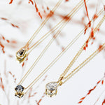 Salt and pepper diamond and white trilliant diamond necklace in 18ct yellow gold.