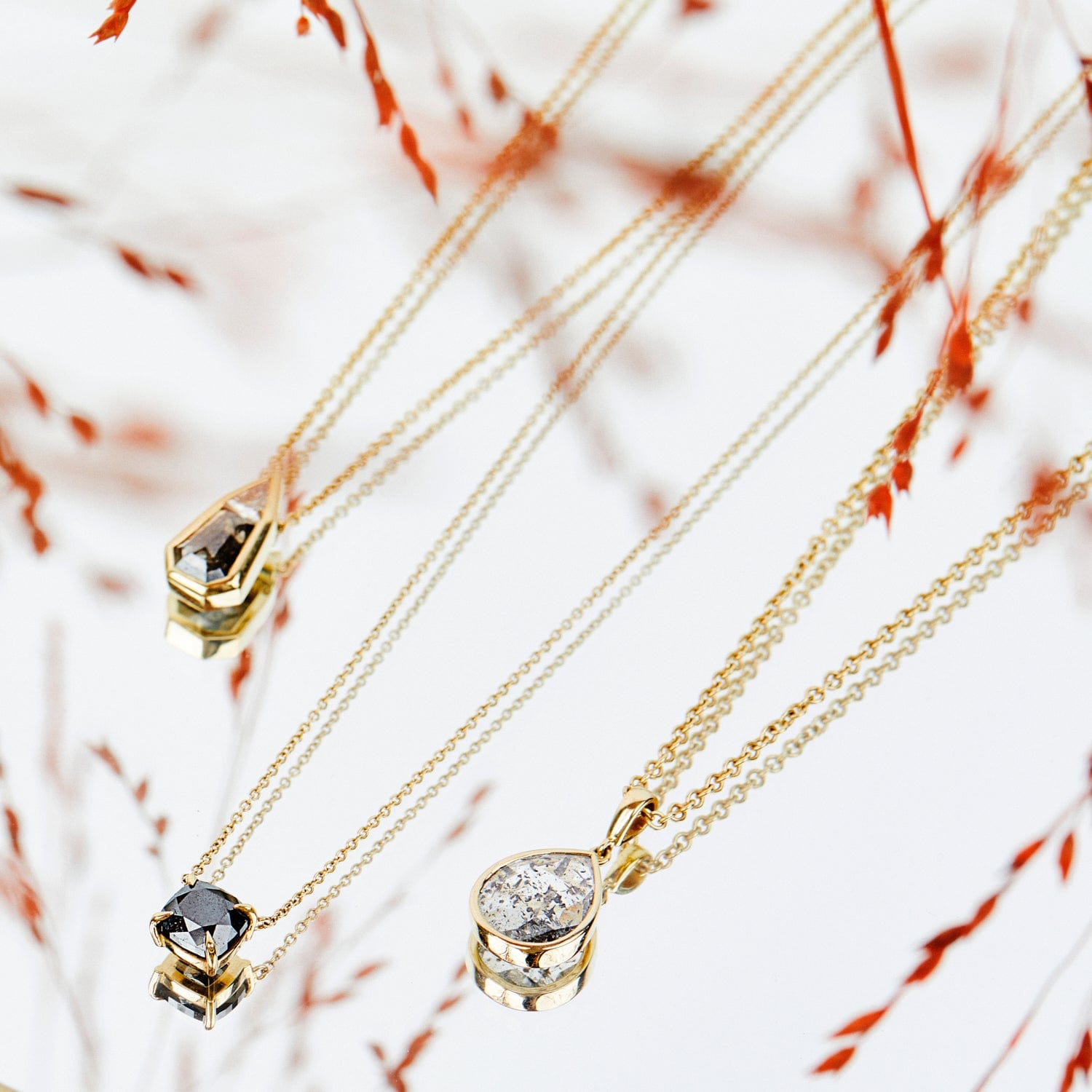 Salt and pepper diamond and white trilliant diamond necklace in 18ct yellow gold.