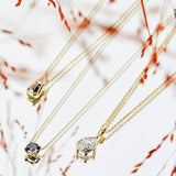 Salt and pepper diamond and white trilliant diamond necklace in 18ct yellow gold.