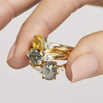 18ct yellow gold salt and pepper oval diamond engagement trilogy ring