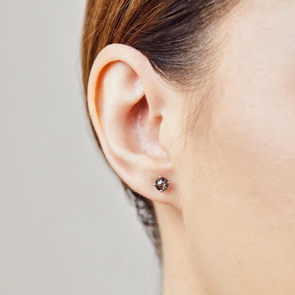 Dark and stormy salt and pepper diamond studs set in 18ct rose gold